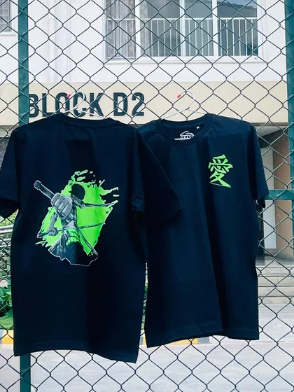 This is one of my favorite custom T-shirt orders, featuring a vibrant anime design. I offer printing on both the front and back, so you can have a small detail like the Japanese symbol for "love" on the front and a full graphic on the back, as shown here.