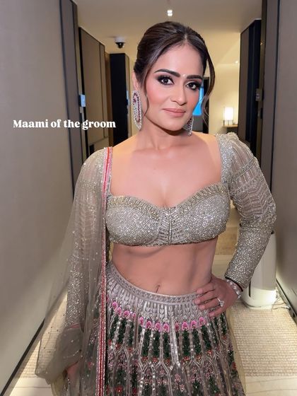 The perfect poser. Her confidence and style shine through, and the makeup is designed to be camera-ready and long-lasting.