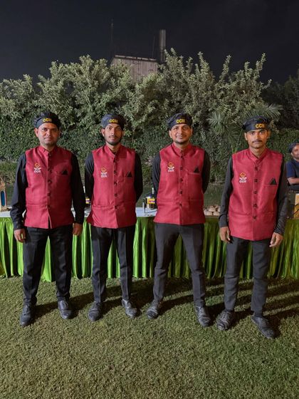 Our team, ready to serve at an outdoor event. Dressed in our signature CCH uniforms, our staff is professional, courteous, and dedicated to making your event a success.