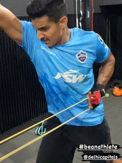 A close-up of a resistance band rotation, showing the athlete's focus and engagement during the exercise.