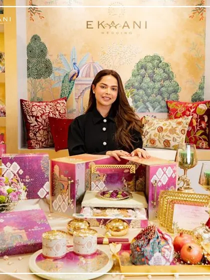 Here I am, surrounded by the elements of a bespoke wedding story I designed. This Pichwai-themed collection, with its vibrant colors and meaningful motifs, shows how I transform a family's vision into a tangible celebration of their heritage.
