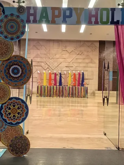 Happy Holi! We set up this vibrant entrance for a corporate office, complete with a custom "Happy Holi" arch and colourful mandala designs. We believe in creating that festive feel from the moment you walk in. 🌸