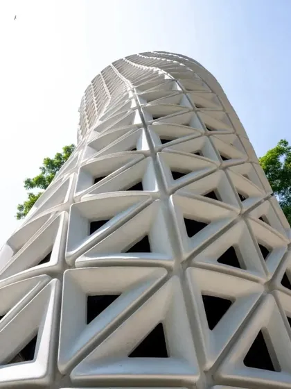 An upward-looking perspective of the VERTO tower, showcasing its dynamic, twisting geometry that is fundamental to its air-cleaning function.