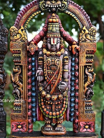 A close-up of the multi-colored 24-inch Balaji statue, highlighting the careful application of color that enhances the carved details.