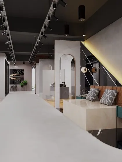 An interior concept for a Kajaria Ceramics showroom. The design uses dramatic track lighting and dark ceilings to create a gallery-like feel, highlighting the tiles as works of art.
