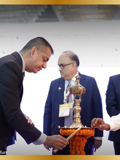 Another respected guest participates in the lamp lighting, a cherished tradition at our event. The ceremony is a formal and auspicious start to our expo, setting a collaborative tone.