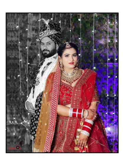 A creative wedding portrait with a color-pop effect, where the bride is in full color and the groom is in black and white, creating a unique artistic look.