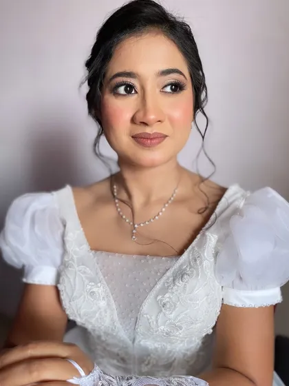 A dreamy look for a Christian wedding. The makeup is soft, romantic, and ethereal, perfectly matching the white gown.