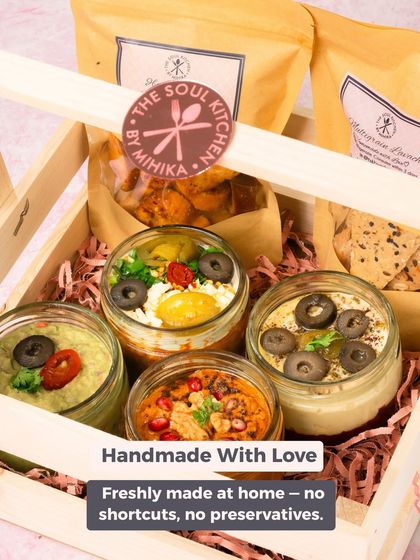 Handmade with love, always. This wooden crate hamper is filled with freshly made dips, with no shortcuts or preservatives, ensuring the authentic taste of home.