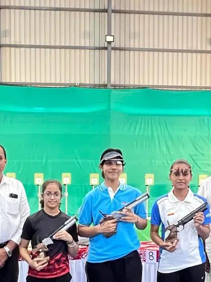 Our women's air pistol team after a strong performance at the Tumkur competition.
