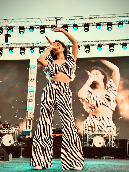 Stage looks are about making a visual impact. For Dhvani Bhanushali's performance, we chose this bold zebra print co-ord set by Ranbir Mukherjee to match her high-energy presence.
