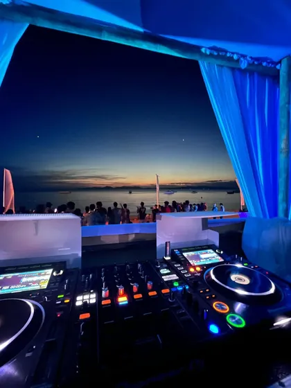 The party continues after dark. The transition from a sunset session to a nighttime beach rave is always magical.
