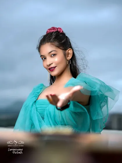 An inviting pose, with the model reaching her hand out to the viewer, creating a connection in this musical portrait.