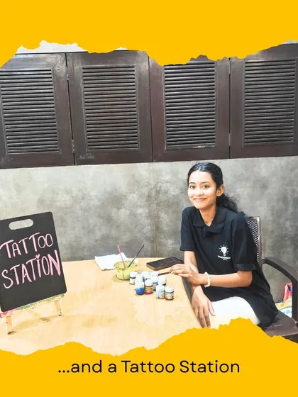 Our friendly host is all set up at the tattoo station, ready to create fun designs for the kids. We make sure every part of the party is fun and well-managed.