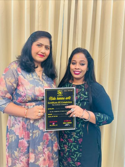 A proud moment with another graduate. Her journey in my class has been incredible, and she is now a certified artist.