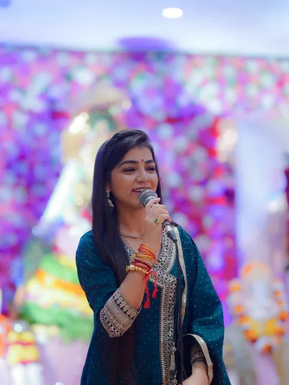 Performing for a showreel. The colorful background and professional setup are part of the grand events I perform at.