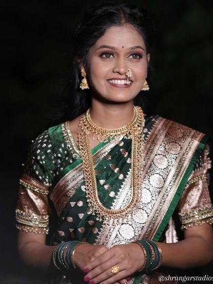 Unique caption for media id 149 describing the specific jewellery and look.