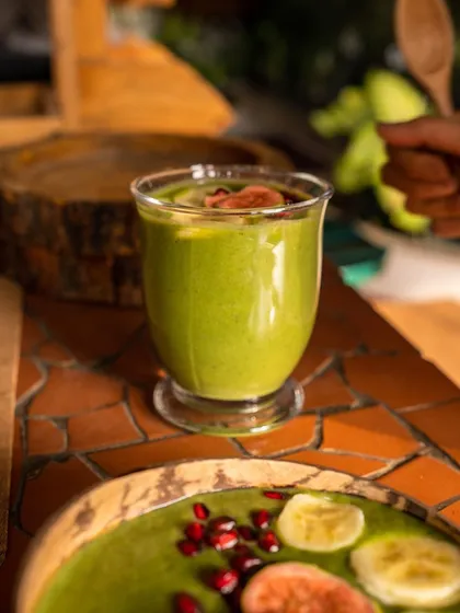 A beautiful green smoothie, a staple in our retreats. Simple additions like this can make a huge difference, as seen in my client testimonials where it helped lower cholesterol and blood sugar.