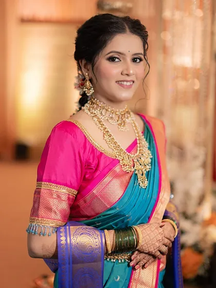 A perfect example of our classic South Indian bridal service. We focused on creating a flawless, dewy base and defined eyes to complement her beautiful Kanjeevaram saree and traditional temple jewellery.