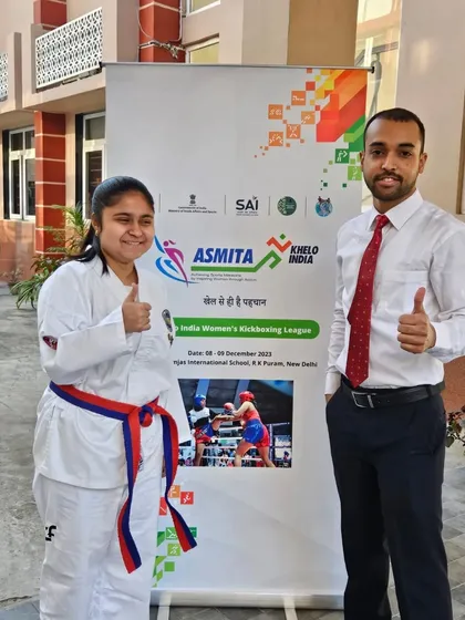 Posing with one of our medal winners at the Khelo India Women's Kickboxing League. Our girls demonstrated exceptional strength and resilience, bringing home multiple medals.