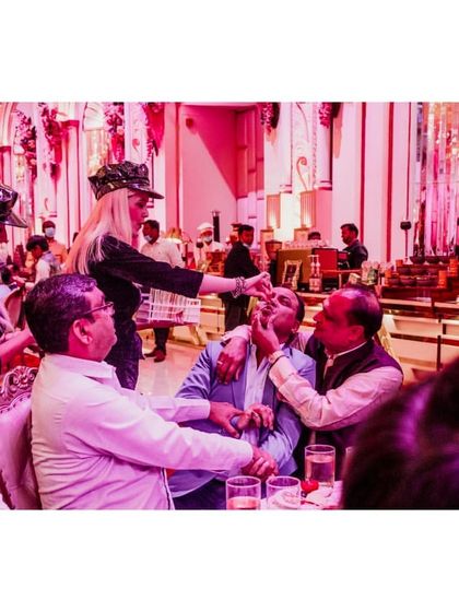 Our international shot girls engage with guests, making sure everyone is having a great time and participating in the fun.