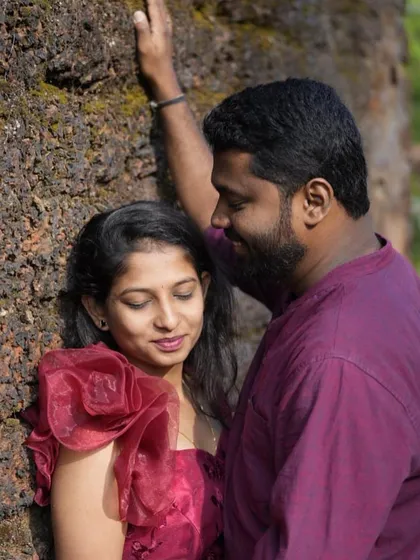 An intimate close-up from a pre-wedding shoot. The unique texture and color of this red organza gown add a touch of modern romance.
