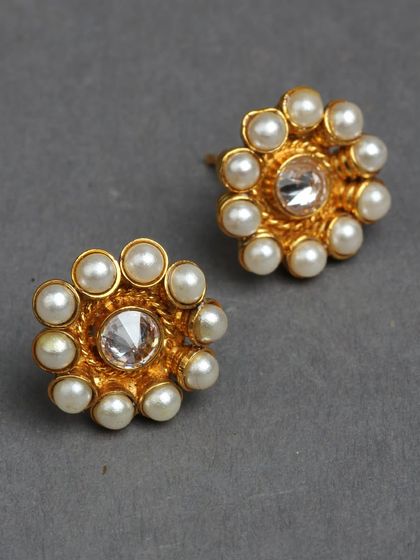 Classic pearl and kundan studs, perfect for an elegant and timeless look.