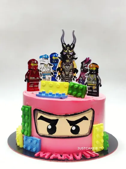 A Ninjago cake featuring the Crystal King and other ninja characters. The design includes edible Lego blocks and a hand-painted ninja face for an authentic look.