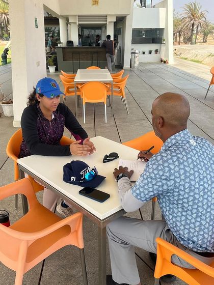 A conversation with a female athlete about her goals and progress. These check-ins are essential for keeping players on track and motivated.