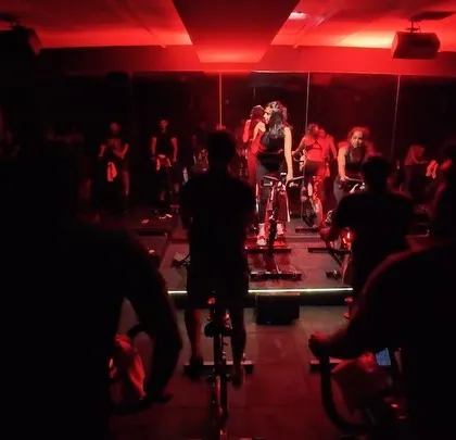 A view from the saddle. This is the collective energy that fuels every class. You are part of a pack, moving and sweating as one.