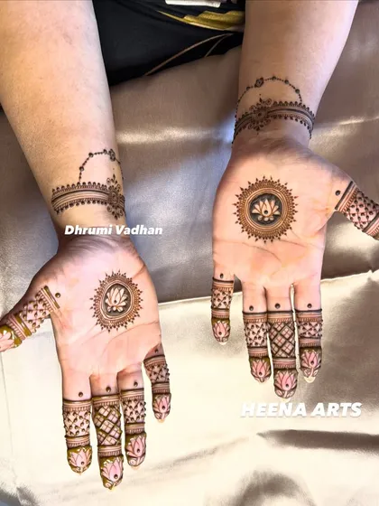 Sometimes, less is more. I also create modern, minimalist mehendi designs for brides and guests who prefer a chic and understated look. This design features a delicate lotus mandala on the palm.