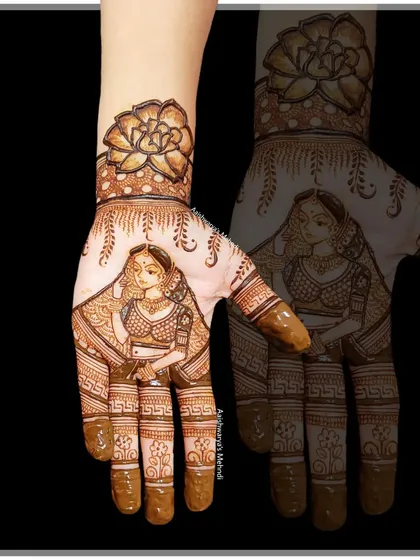 A beautiful bride portrait on the palm, complemented by a large lotus flower on the wrist. This design is both personal and traditionally elegant.