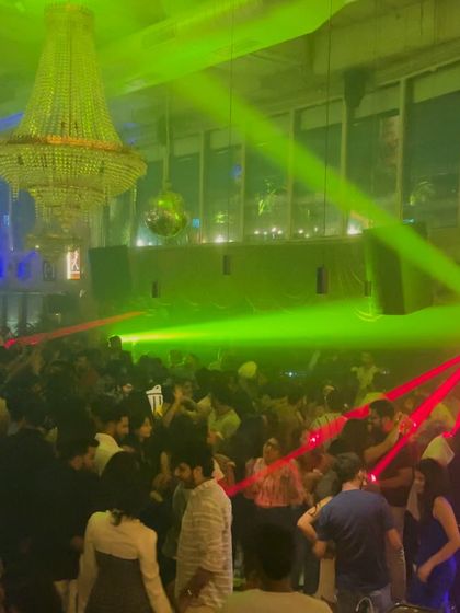 The stunning ambiance of a packed club with lasers cutting through the haze. I thrive in these high-energy environments.