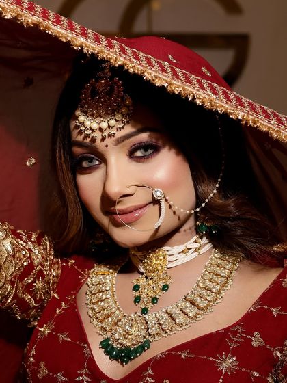 A close-up under the veil, this shot highlights the flawless skin and captivating eyes that are key to my bridal makeup philosophy. It’s about creating a look that feels both glamorous and authentically you.
