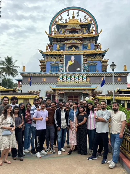 A full group picture at the magnificent Namdroling Monastery in Coorg, a highlight for many of our travelers.