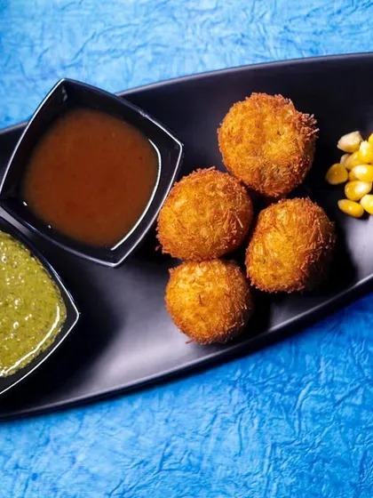 Lip-smacking cheese and corn balls, served with mint and tamarind chutneys. A classic appetizer that is always a hit with guests of all ages.