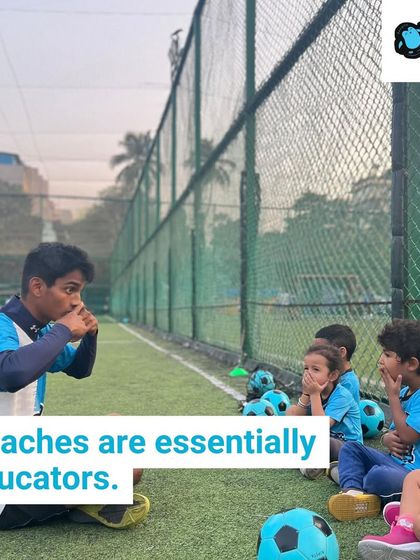 Our coaches are essentially educators. Here, a coach is explaining a drill to an attentive group of kids, demonstrating how we create a focused and respectful learning environment.
