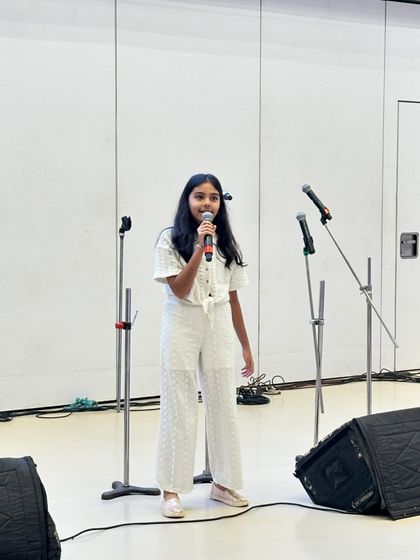 A talented young student takes the stage to perform at our 'The Sound of Support' fundraiser. We love providing a platform for our students to showcase their skills and build confidence.