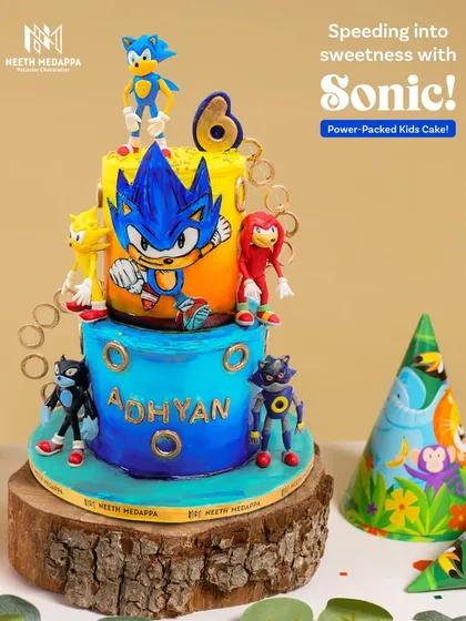 Gotta go fast! This Sonic the Hedgehog cake was a blast to create for a 6th birthday. Packed with action, this two-tiered cake features hand-painted details and fondant figures of Sonic and his friends, bringing the energy of the game to the dessert table.
