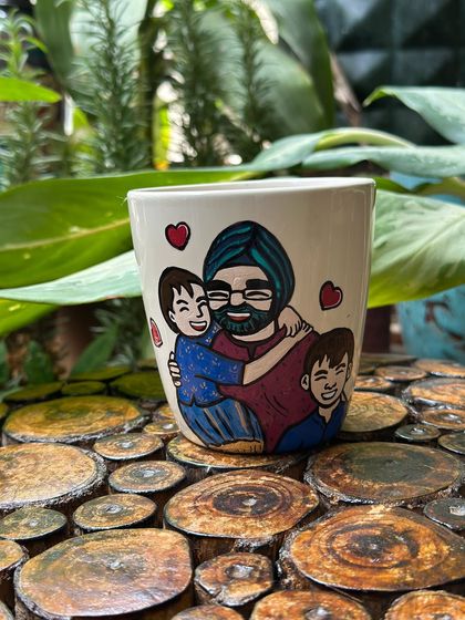 This Father's Day mug captures a warm hug between a father and his two sons.