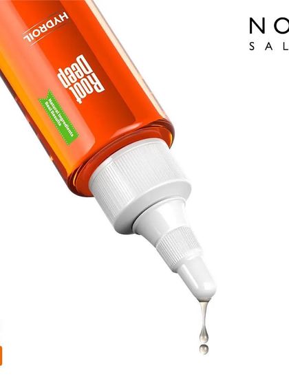The applicator tip of the Root Deep Hydroil allows for precise, direct-to-scalp application, ensuring the potent formula gets exactly where it's needed most.