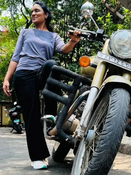 A moment of pride and confidence. This rider embodies the spirit of Heels on Wheels, ready to roar through life with grace and grit.