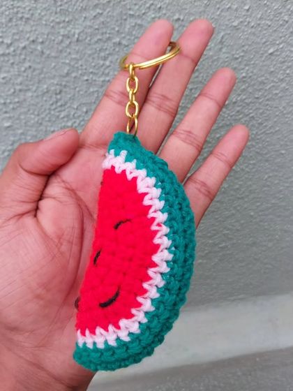 A juicy slice of crochet watermelon to remind you of summer days. This keychain is detailed with a rind, flesh, and tiny seeds.