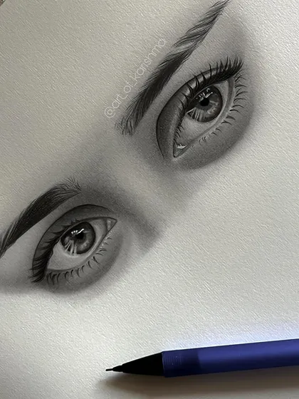 A close up view of the eye sketch, highlighting the individual lashes and the subtle reflections.