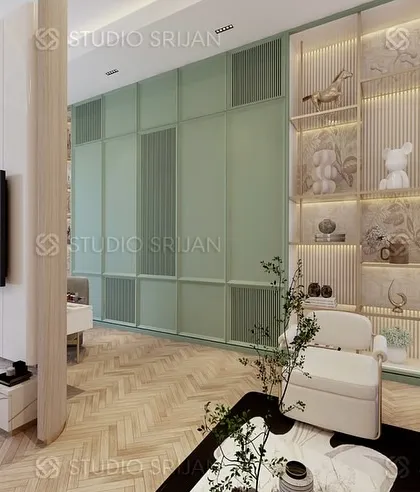 In this Alameda bedroom, the dressing area is defined by a wall of custom-built, mint-green wardrobes with elegant display niches.