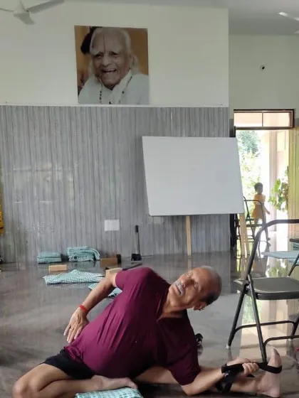 A seated twist using a strap.