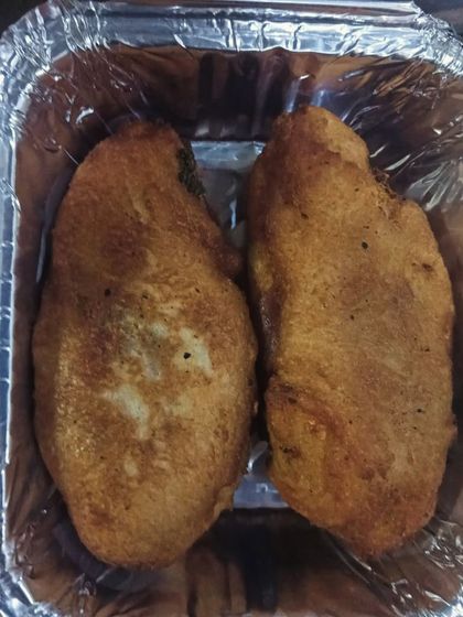 A close-up of my homemade bread rolls, fried to a perfect golden brown.