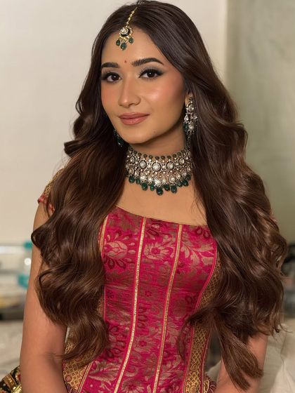 A close-up of the Roka bride, showing the healthy shine and soft texture of her open hairstyle.