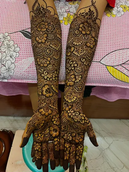 Full bridal arms for my client Maishar. This design is packed with traditional motifs, including paisleys, flowers, and intricate net patterns.