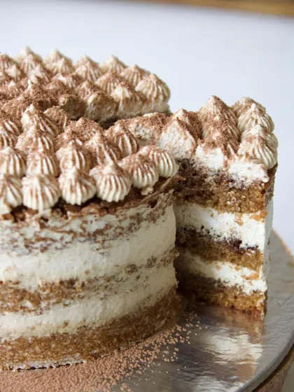 My version of the classic Tiramisu cake is completely vegan and refined sugar-free. I layer a light, coffee-soaked sponge with creamy, plant-based mascarpone and finish it with a dusting of cocoa powder for an elegant and healthy dessert.